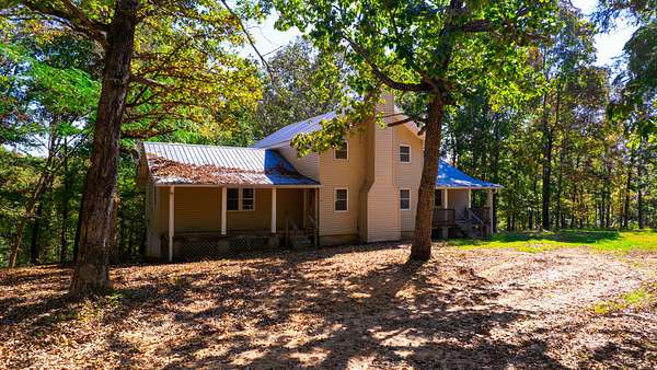 40 Acres of Recreational Land with Home for Auction in Dover, Tennessee