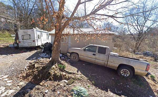 0.5 Acres of Residential Land with Home for Sale in Lenoir City, Tennessee