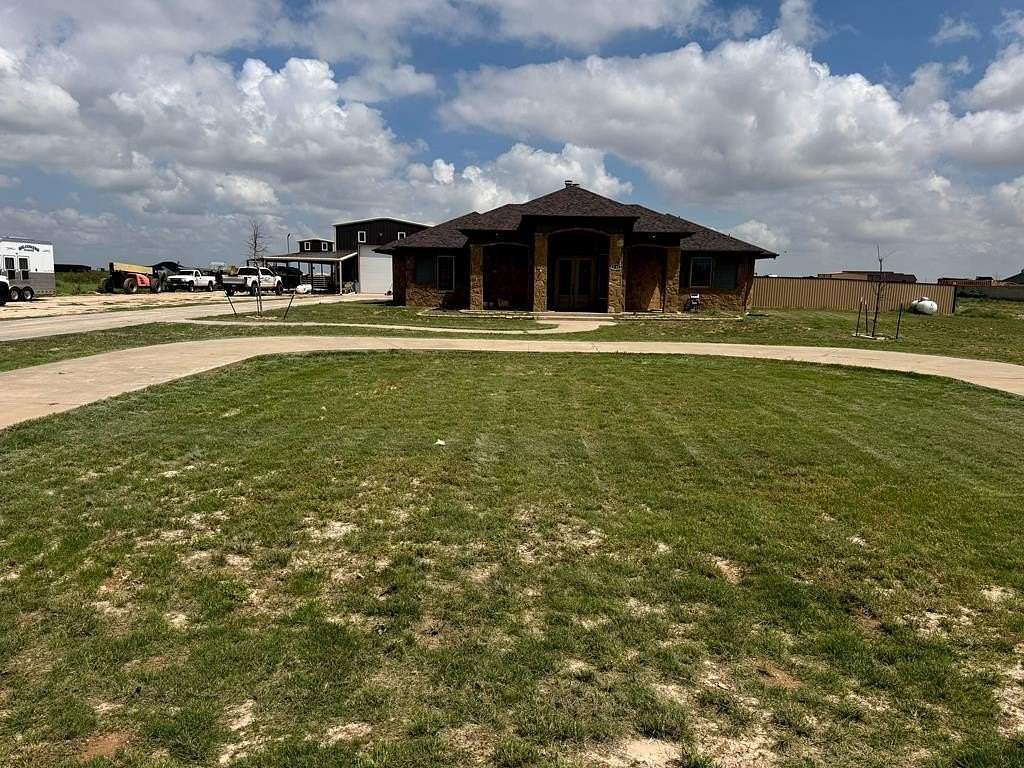 4.8 Acres of Residential Land with Home for Lease in Midland, Texas