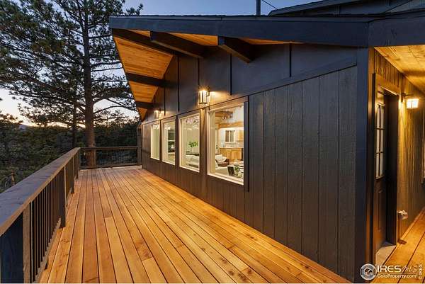 5.63 Acres of Residential Land with Home for Sale in Red Feather Lakes, Colorado