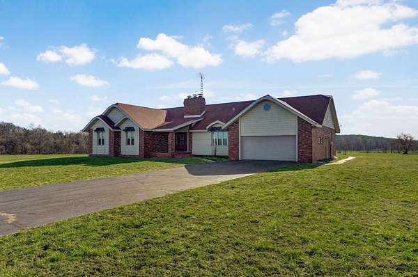 2.29 Acres of Residential Land with Home for Sale in Miller, Missouri