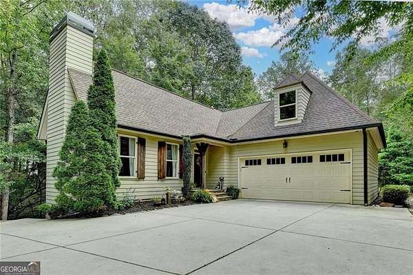 3.4 Acres of Residential Land with Home for Sale in Cumming, Georgia