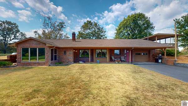 97 Acres of Agricultural Land with Home for Sale in Benton, Kentucky