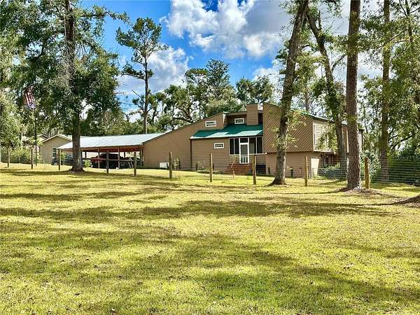 11.5 Acres of Land with Home for Sale in Madison, Florida
