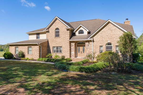 11.8 Acres of Land with Home for Sale in McDonald, Tennessee