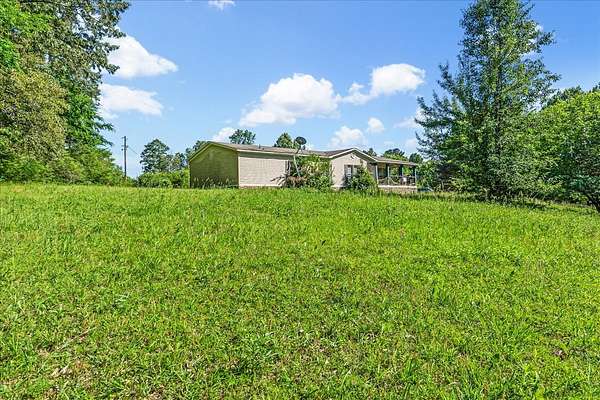 4.53 Acres of Residential Land with Home for Sale in Luray, Tennessee