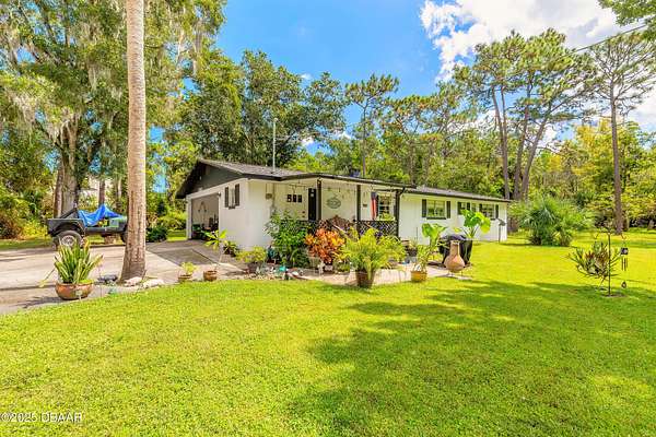 5 Acres of Residential Land with Home for Sale in Ormond Beach, Florida