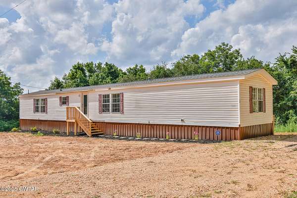 2.46 Acres of Residential Land with Home for Sale in Martin, Tennessee