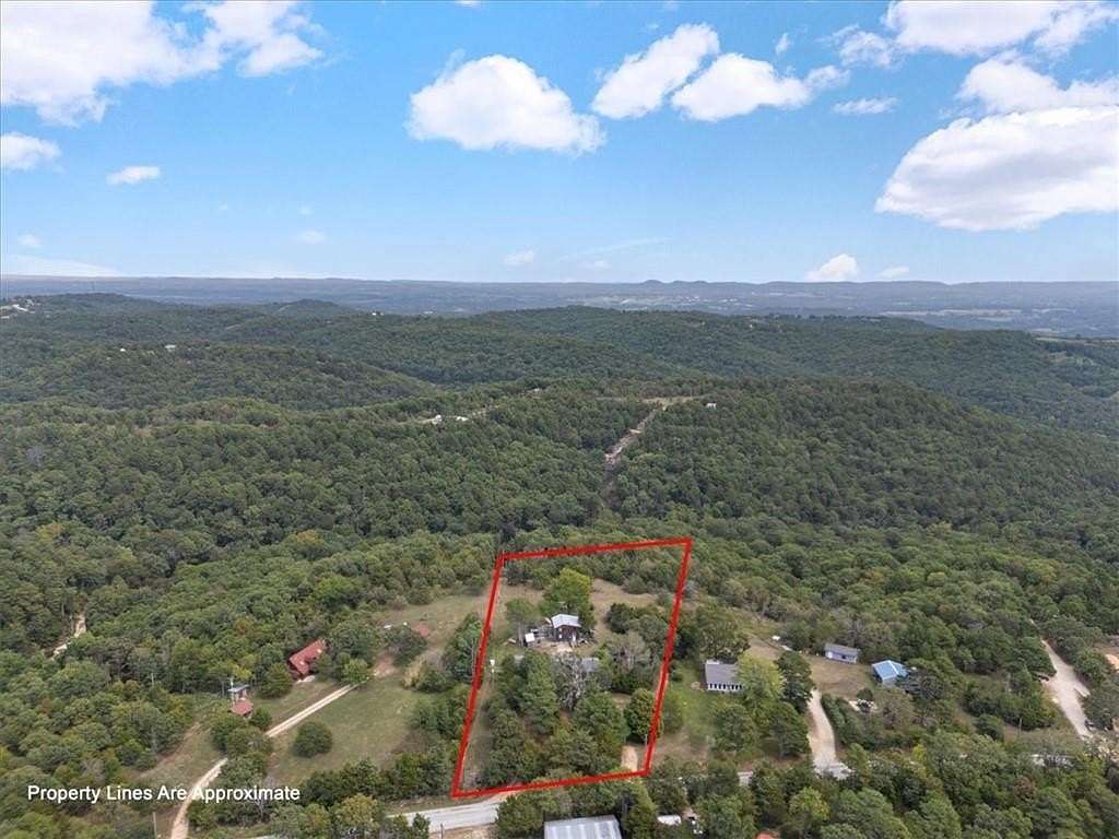 2.2 Acres of Residential Land with Home for Sale in Eureka Springs, Arkansas