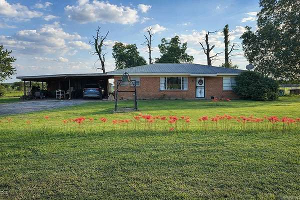 1.5 Acres of Land with Home for Sale in Dumas, Arkansas