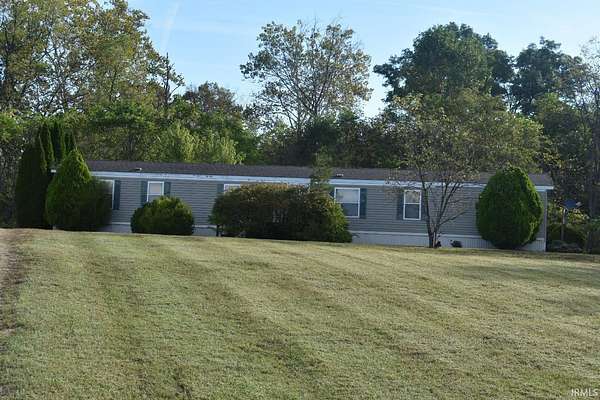 30.3 Acres of Land with Home for Sale in Bedford, Indiana