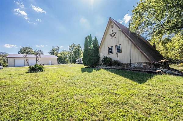 19.3 Acres of Land with Home for Sale in Morgantown, Kentucky