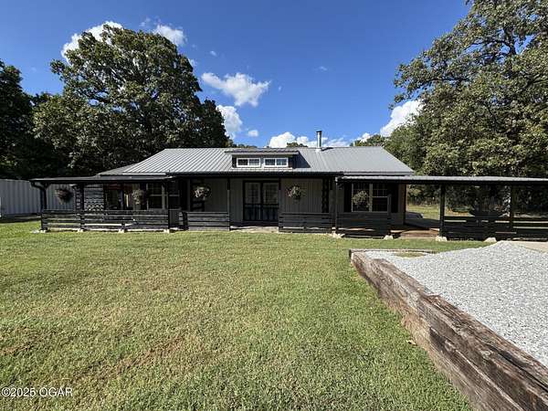 5 Acres of Residential Land with Home for Sale in Seneca, Missouri