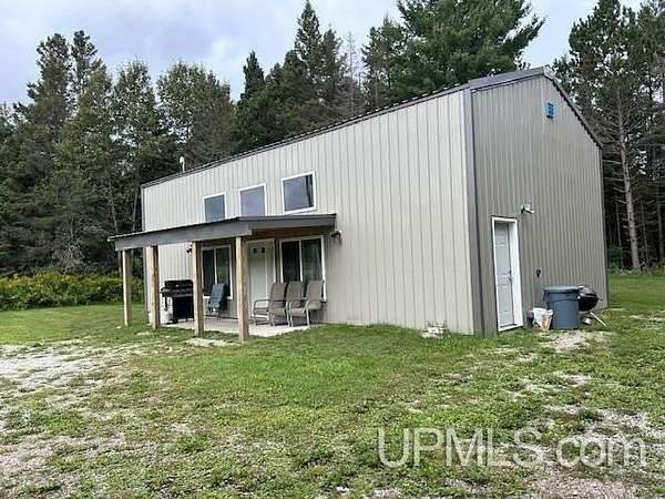 5.24 Acres of Land with Home for Sale in Chatham, Michigan