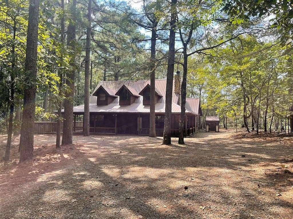 1.68 Acres of Residential Land with Home for Sale in Broken Bow, Oklahoma