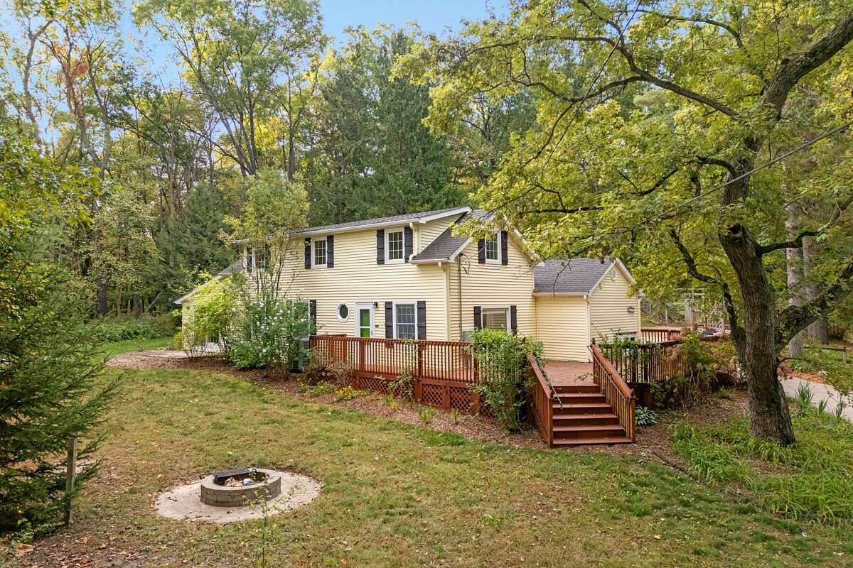 3 Acres of Land with Home for Sale in Ada, Michigan
