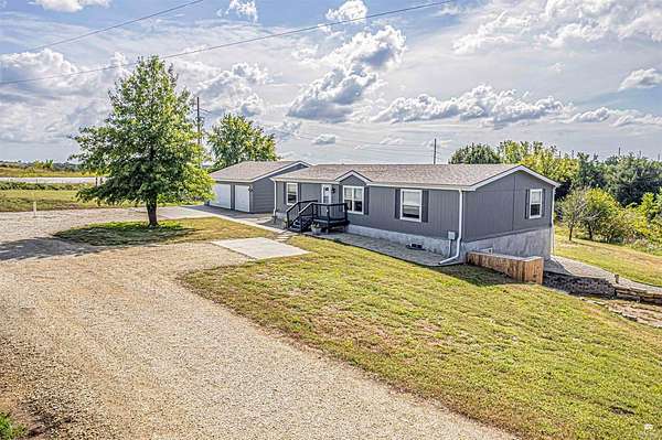 8.3 Acres of Residential Land with Home for Sale in Milford, Kansas