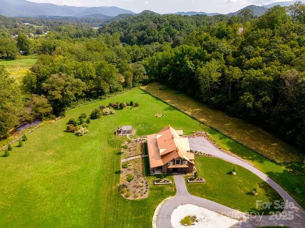 19 Acres of Land with Home for Sale in Fletcher, North Carolina