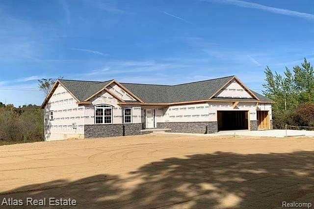 3 Acres of Residential Land with Home for Sale in Goodrich, Michigan