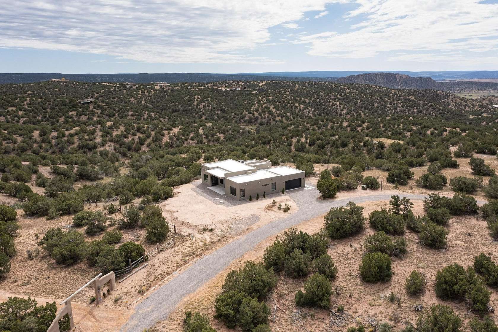 10 Acres of Land with Home for Sale in Lamy, New Mexico