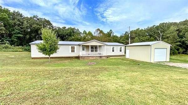 6.29 Acres of Land with Home for Sale in Stilwell, Oklahoma