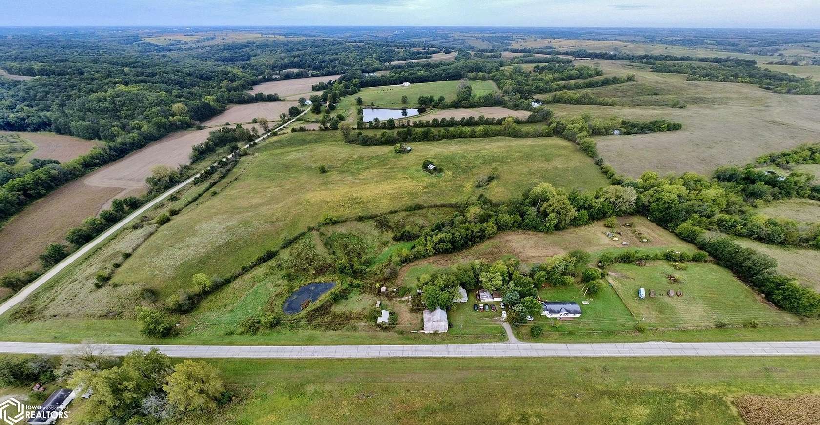 37.5 Acres of Agricultural Land with Home for Sale in Lacona, Iowa