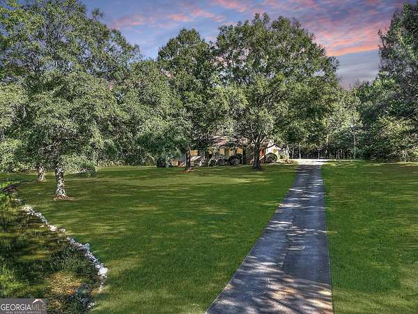 5.3 Acres of Residential Land with Home for Sale in Loganville, Georgia