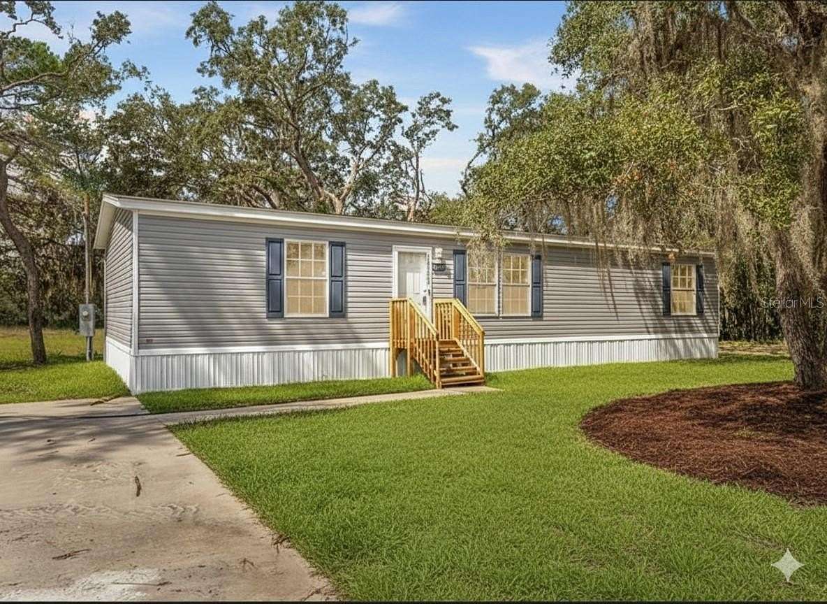 1.8 Acres of Residential Land with Home for Sale in Hudson, Florida