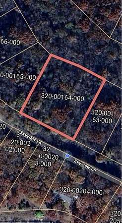 1 Acre of Residential Land for Sale in Holiday Island, Arkansas