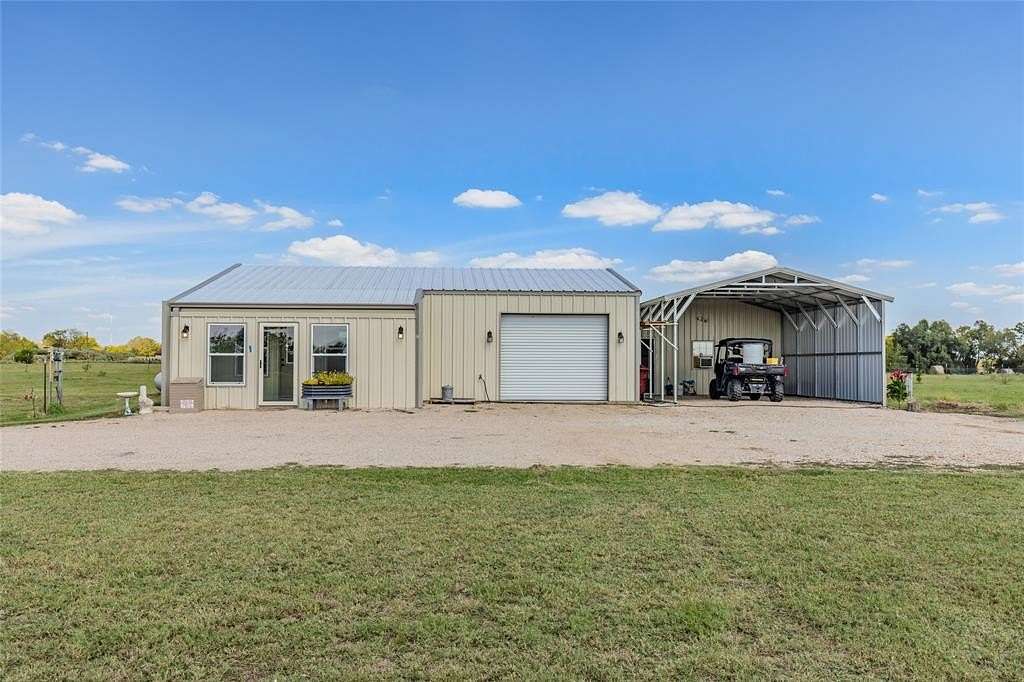 10.8 Acres of Land with Home for Sale in Brashear, Texas