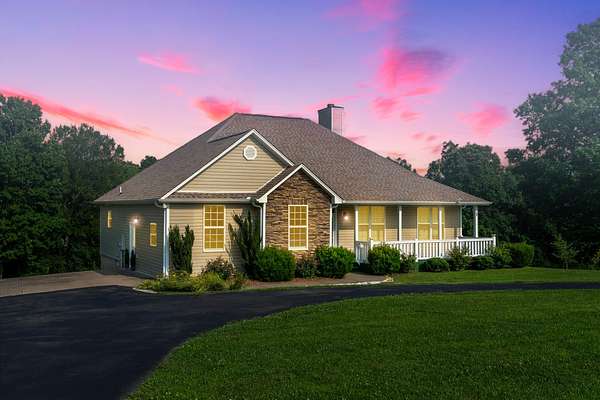 5 Acres of Residential Land with Home for Sale in Palmyra, Tennessee