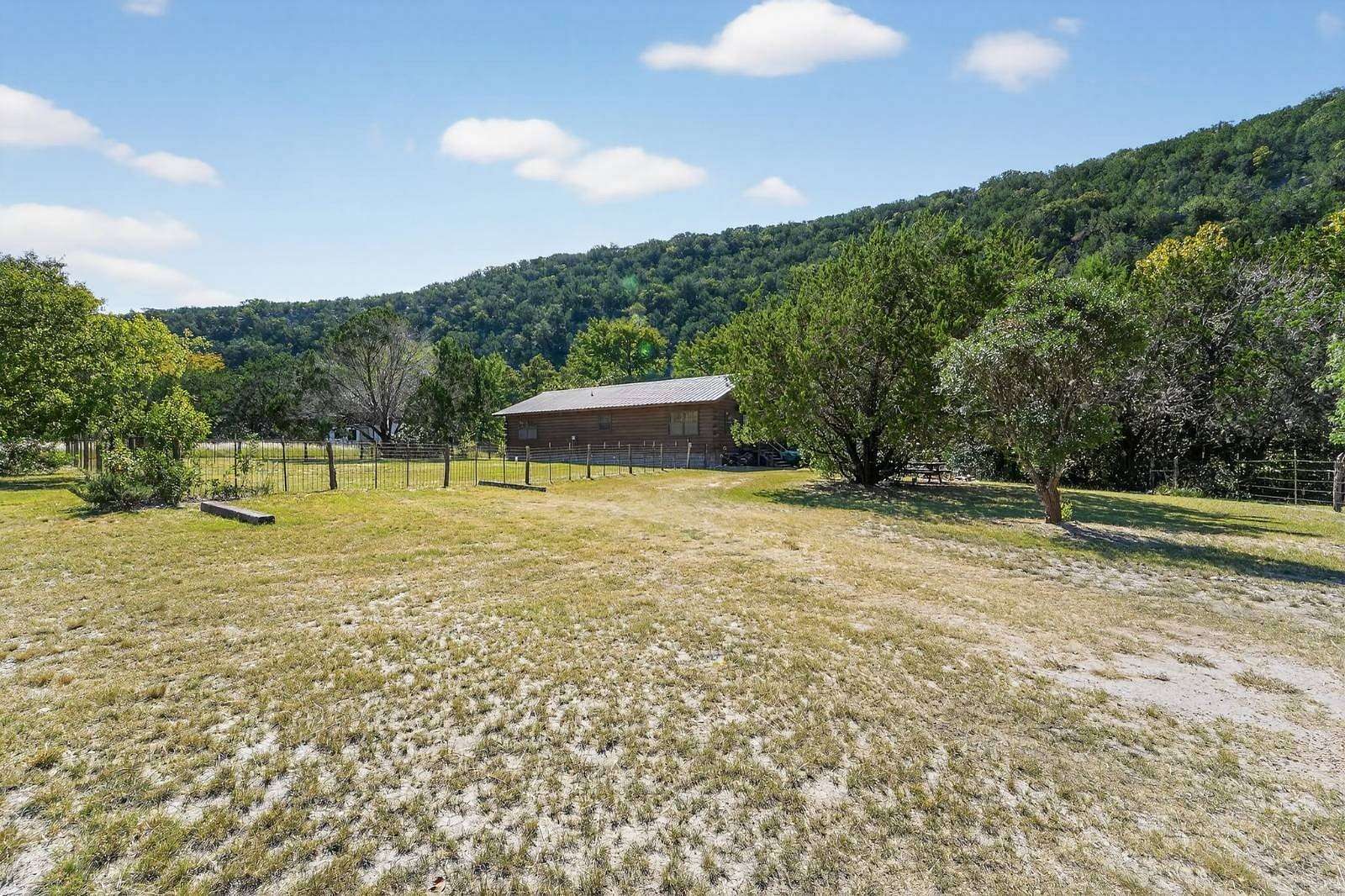 5 Acres of Residential Land with Home for Sale in Leakey, Texas