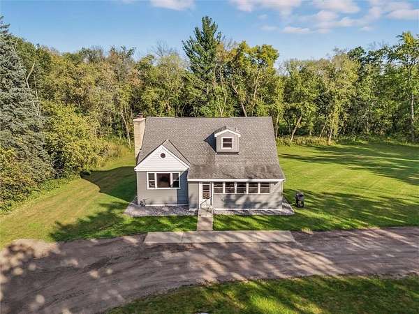 5 Acres of Residential Land with Home for Sale in Nowthen, Minnesota