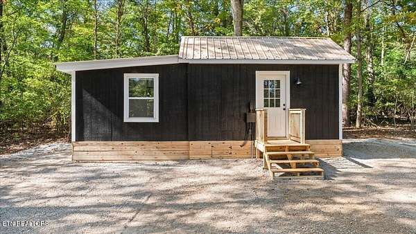 0.53 Acres of Residential Land with Home for Sale in Sweetwater, Tennessee