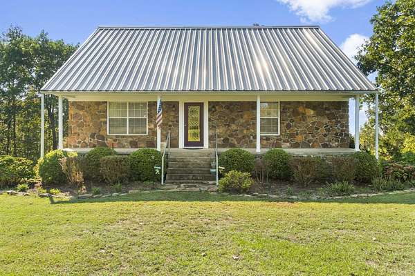 8.32 Acres of Land with Home for Sale in Pangburn, Arkansas