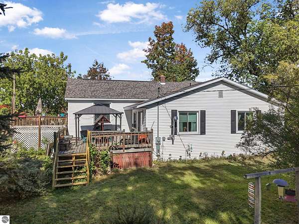 5 Acres of Residential Land with Home for Sale in Lake City, Michigan