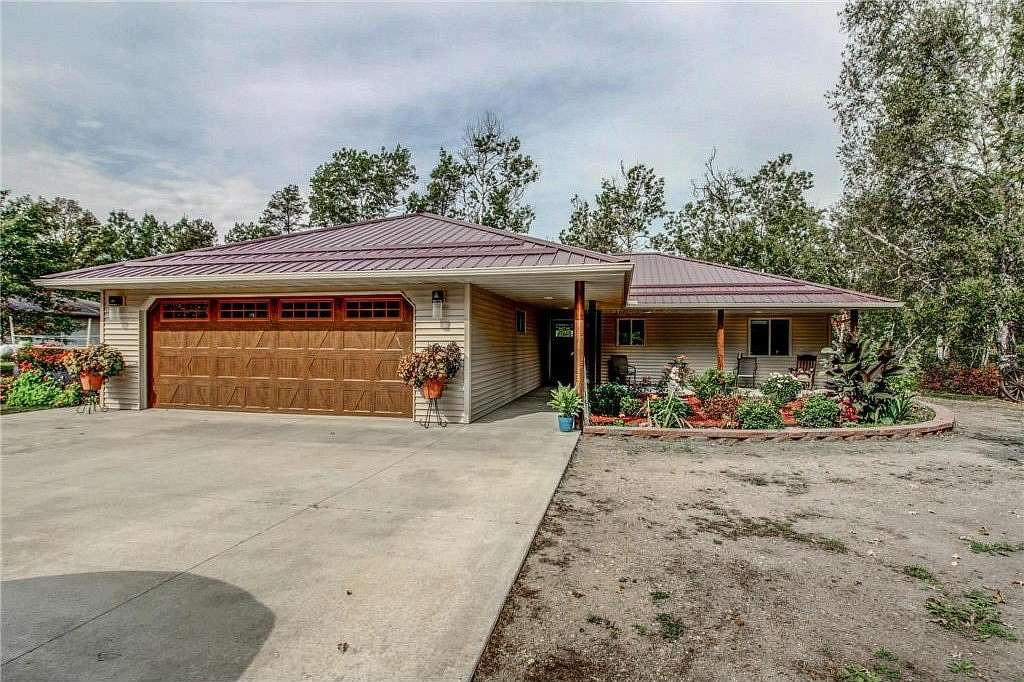 1.69 Acres of Residential Land with Home for Sale in Menahga, Minnesota