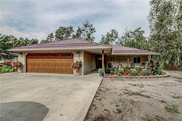 1.69 Acres of Residential Land with Home for Sale in Menahga, Minnesota