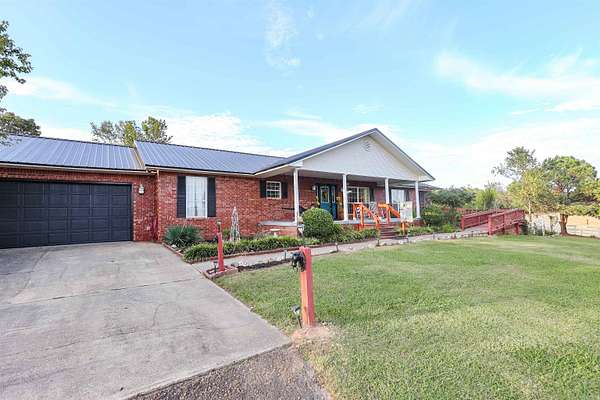 8.38 Acres of Residential Land with Home for Sale in Norman, Arkansas
