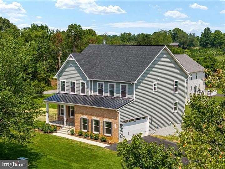 5 Acres of Residential Land with Home for Sale in Huntingtown, Maryland