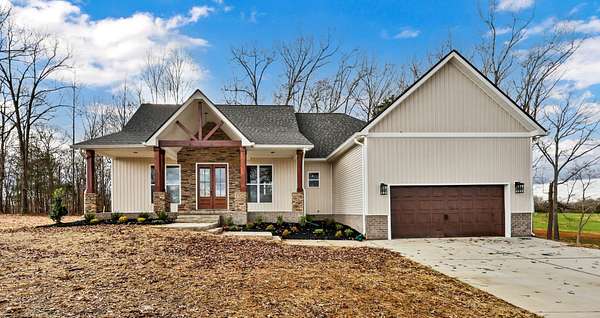 1.54 Acres of Residential Land with Home for Sale in Southside, Tennessee