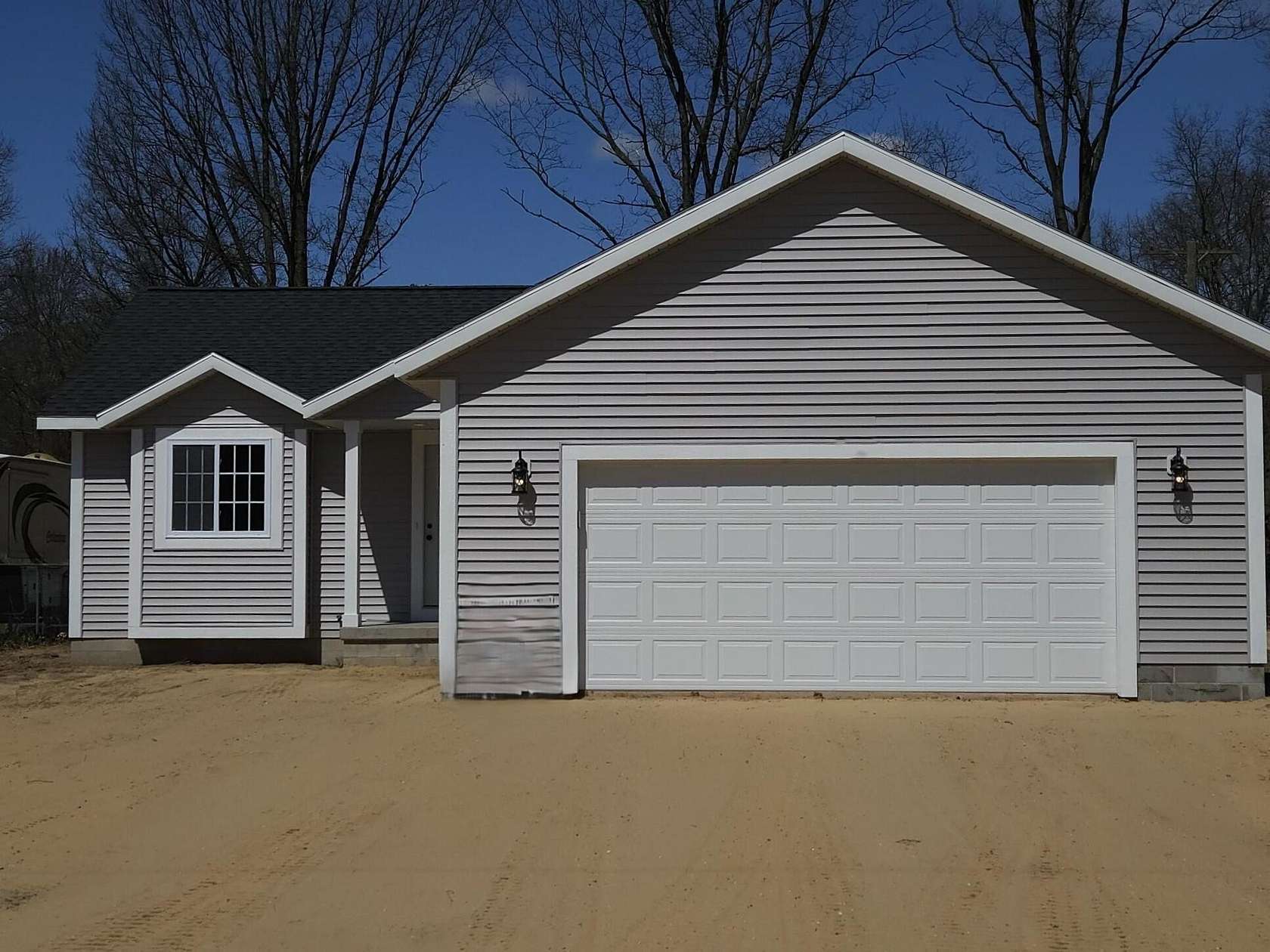 1.54 Acres of Residential Land with Home for Sale in Holton, Michigan