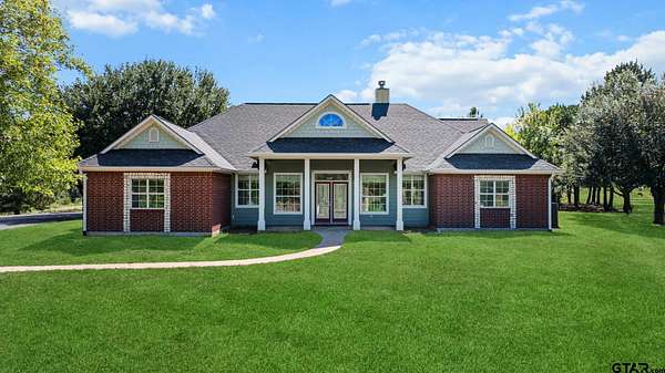 10 Acres of Residential Land with Home for Sale in Quitman, Texas