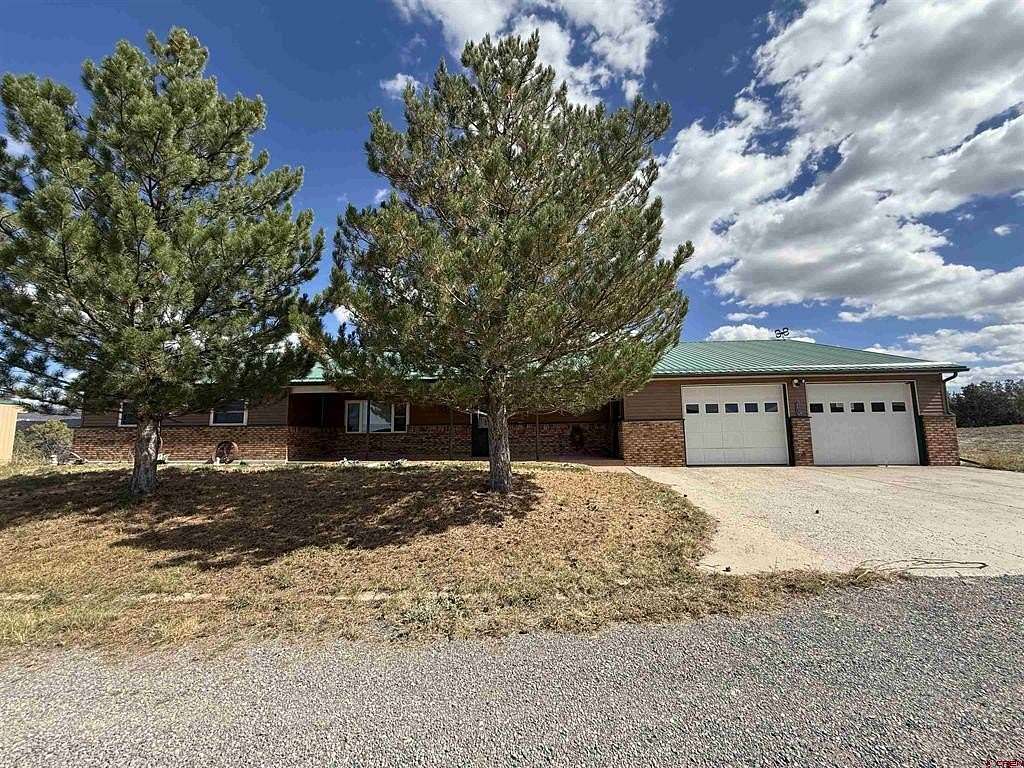 40 Acres of Land with Home for Sale in Crawford, Colorado