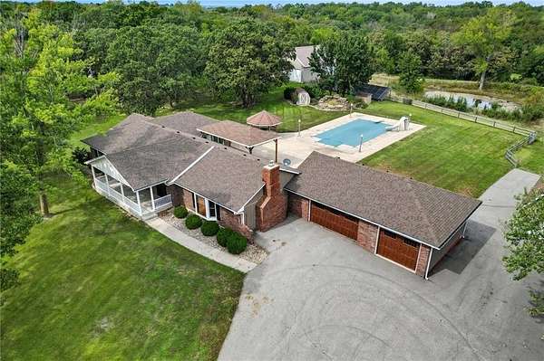 9.87 Acres of Residential Land with Home for Sale in Grain Valley, Missouri