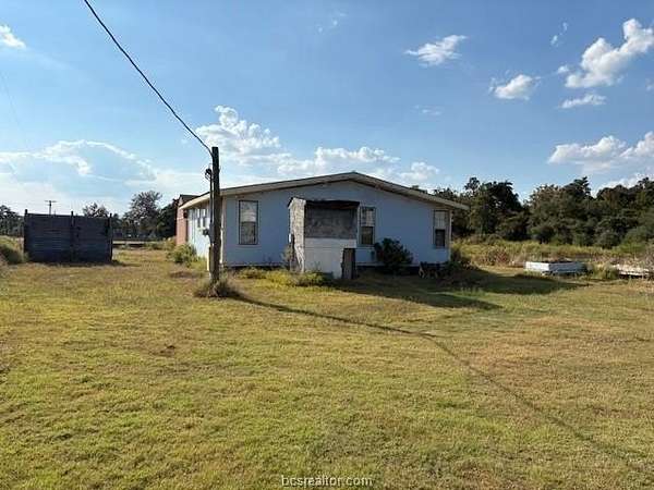 5 Acres of Residential Land with Home for Sale in Normangee, Texas