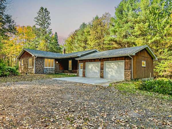 40 Acres of Land with Home for Sale in Irma, Wisconsin