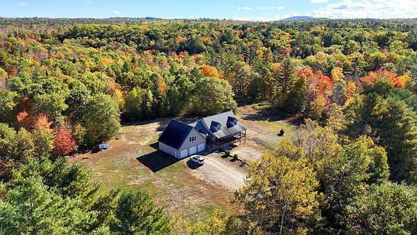 20 Acres of Recreational Land with Home for Sale in Jay, Maine