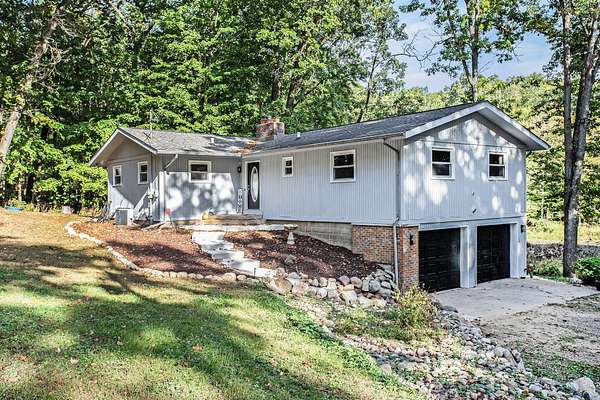 19.1 Acres of Land with Home for Sale in Battle Creek, Michigan