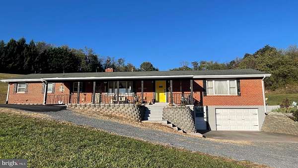 10.3 Acres of Land with Home for Sale in Romney, West Virginia